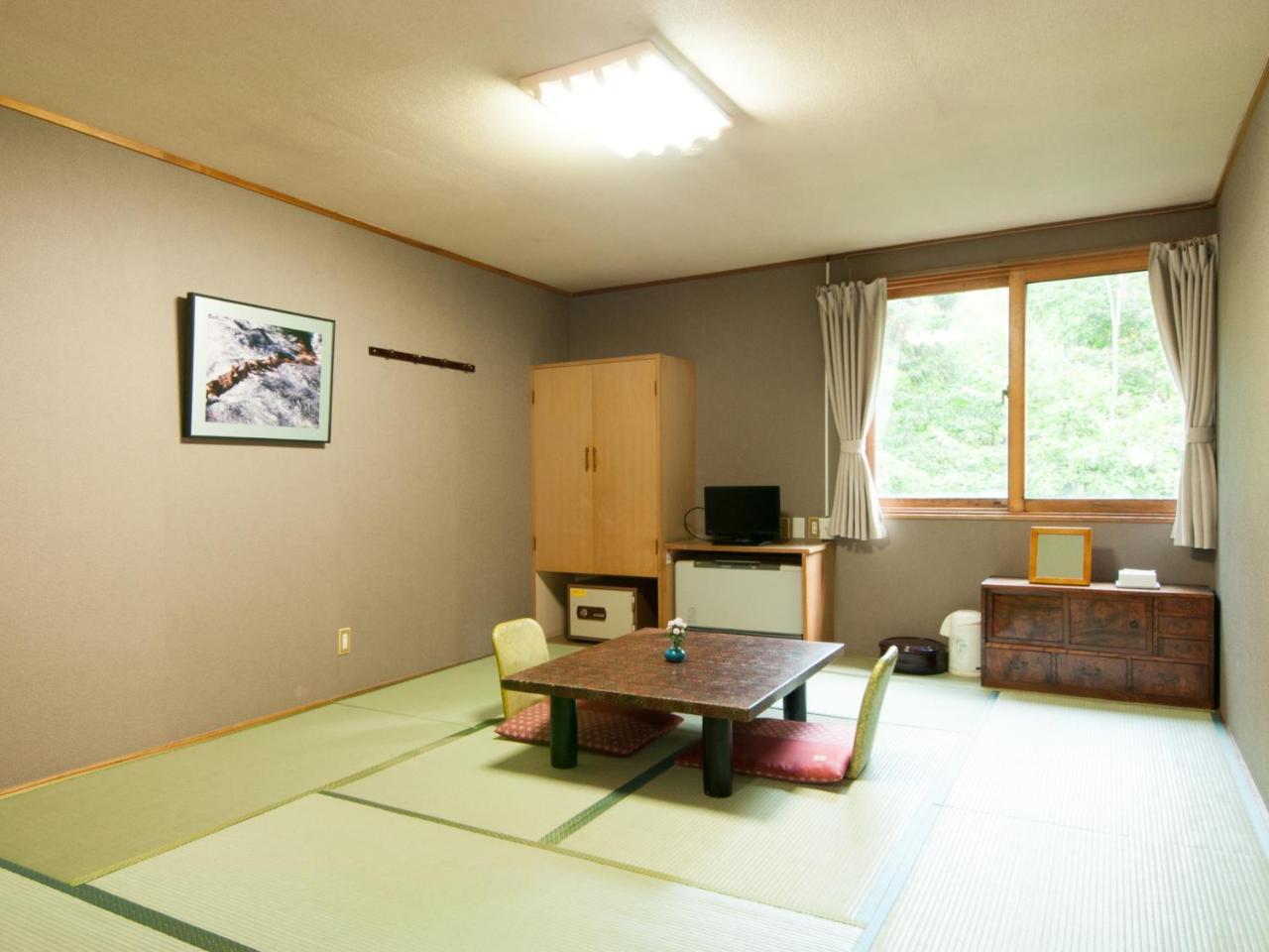 Отель Yachi Onsen Товада Экстерьер фото